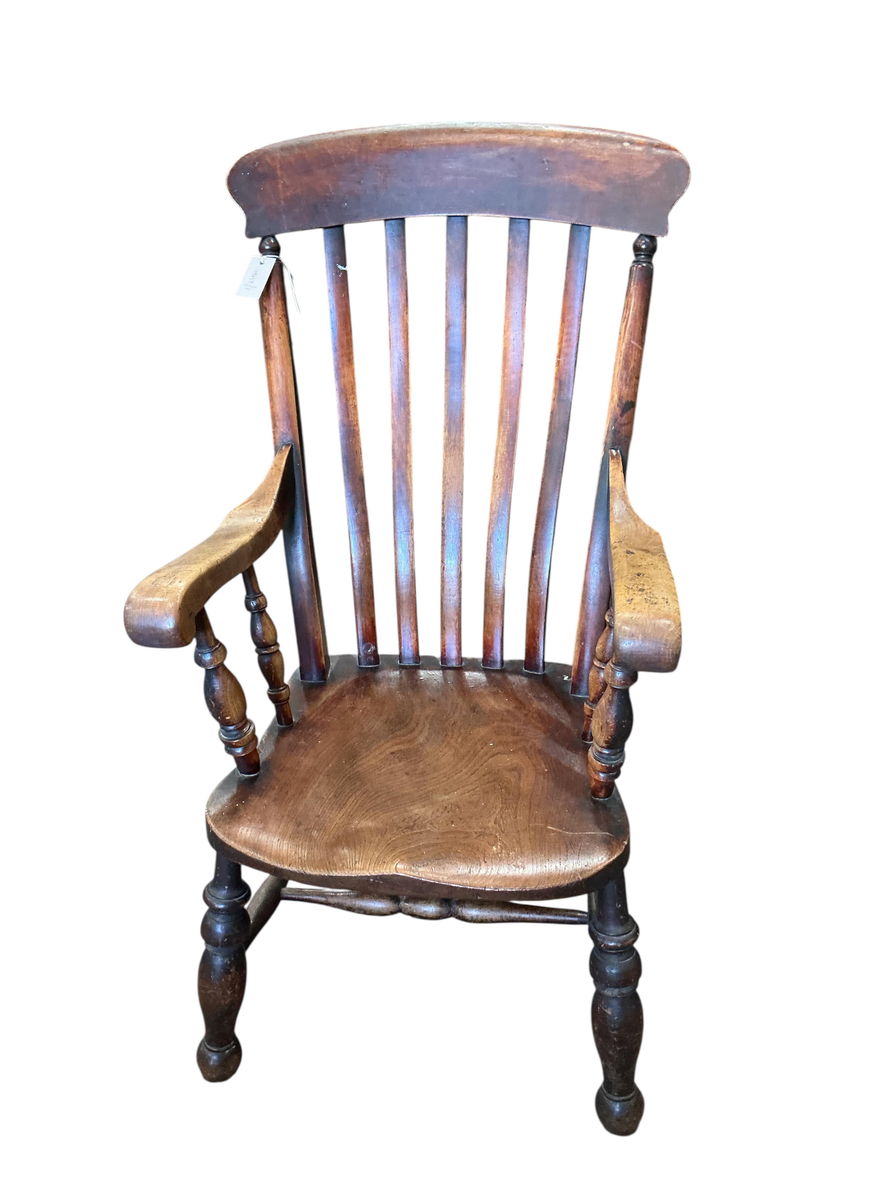 A Victorian elm and beech Windsor lathe back armchair, width 54cm, depth 52cm, height 108cm